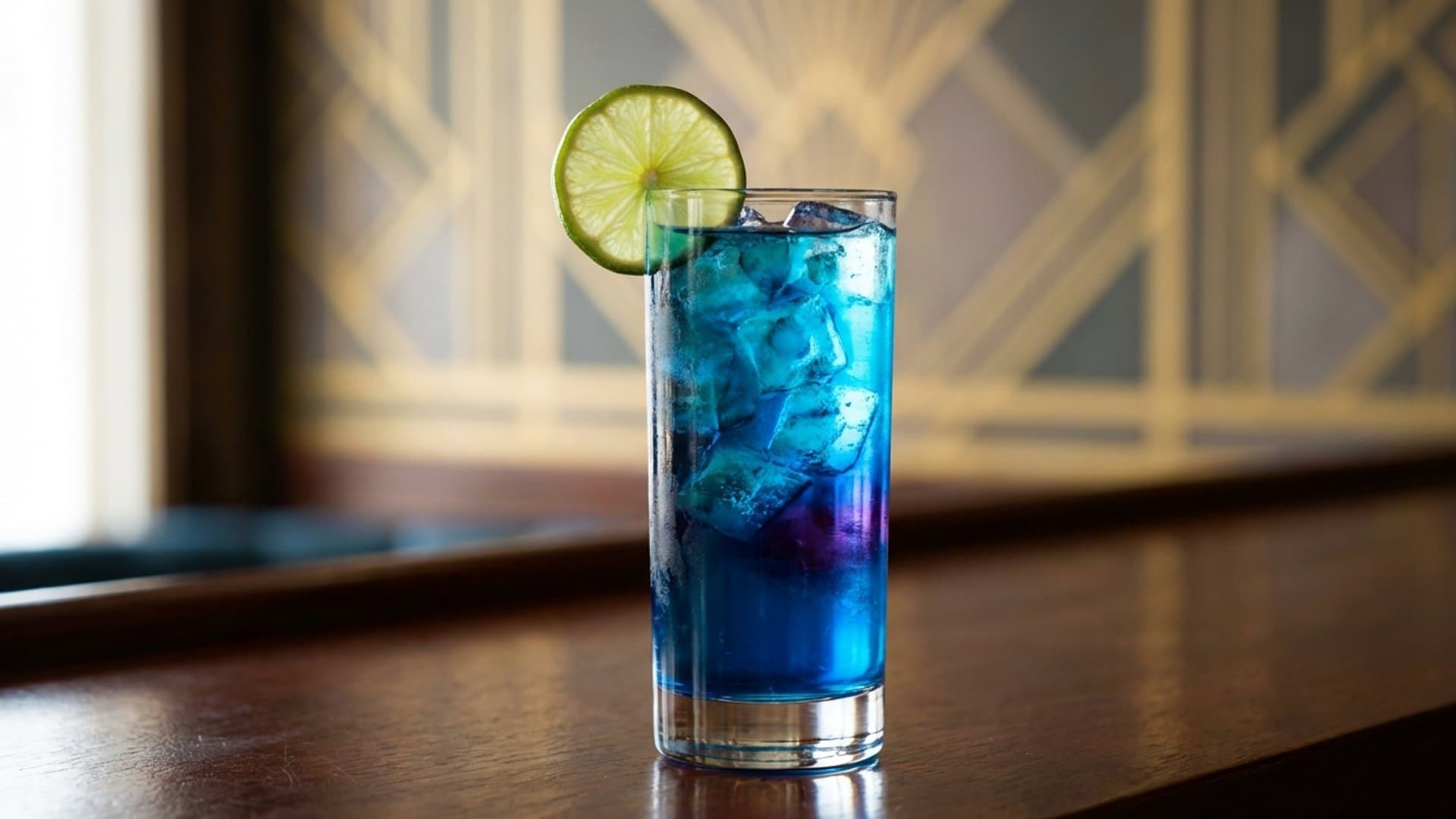 Electric Starter cocktail in a highball garnished with lime wheel