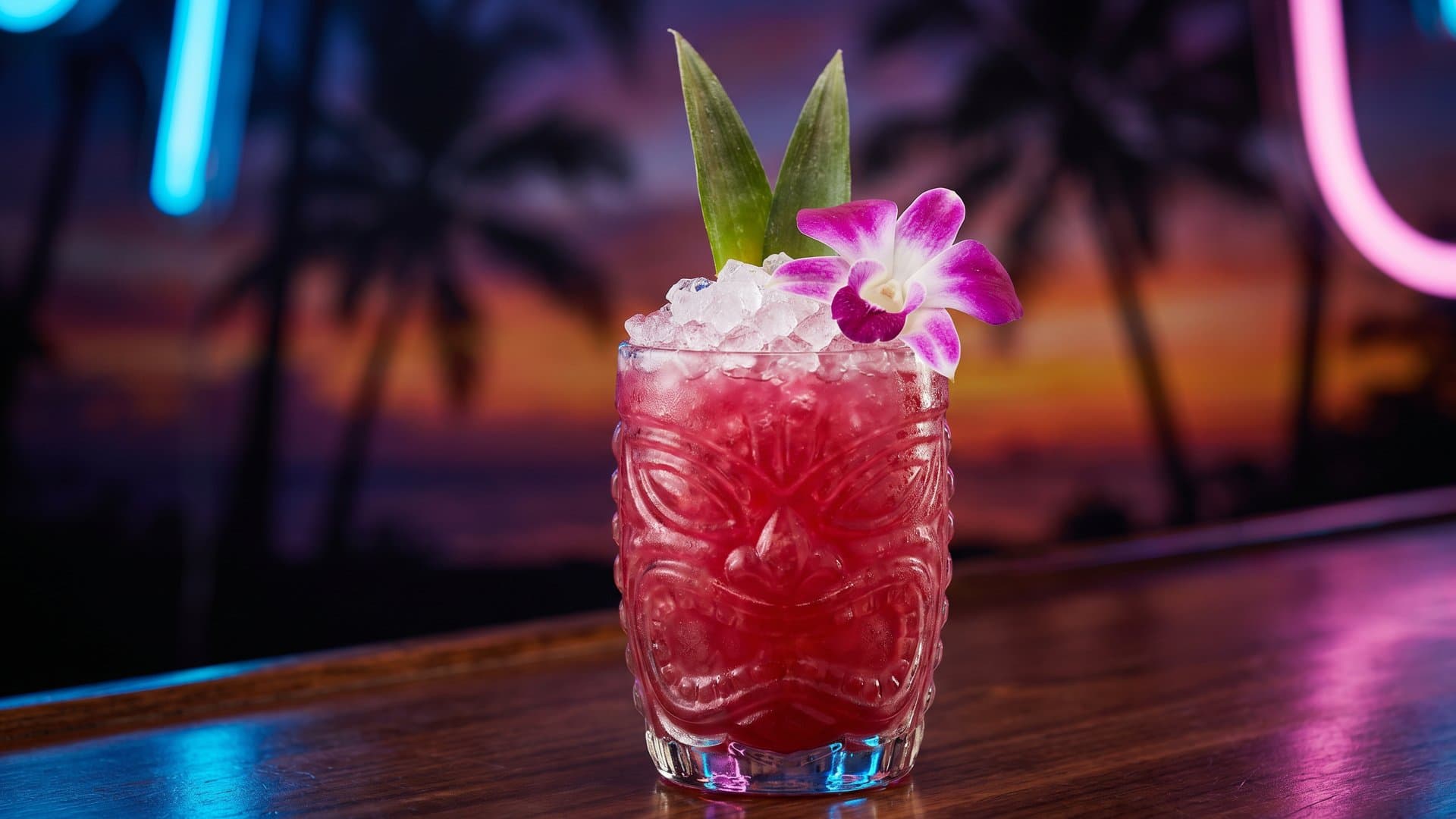 Tradewind Serenade cocktail in a tiki mug garnished with pineapple fronds and edible orchid
