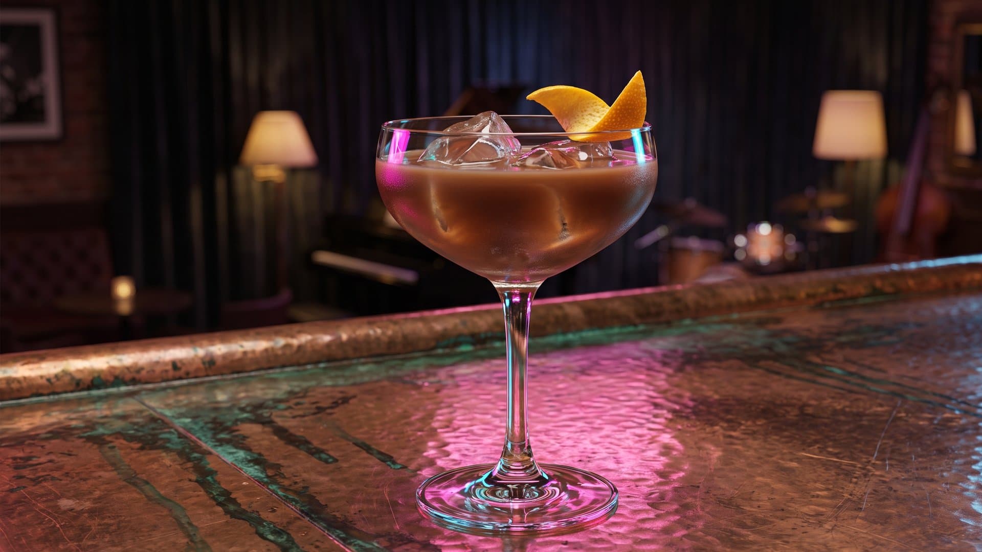 The Patriarch cocktail in a coupe garnished with expressed orange peel